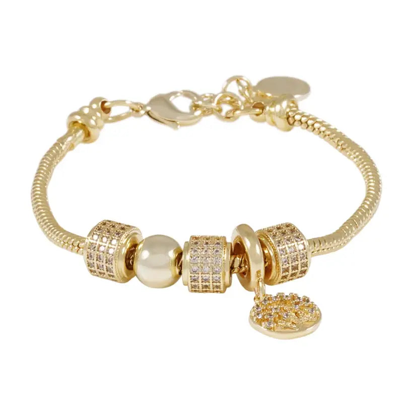 SNÖ Cicce coin brace gold/clear - Armband