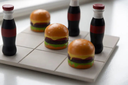 DD Tre i rad ’cola & burgare’ - Spel