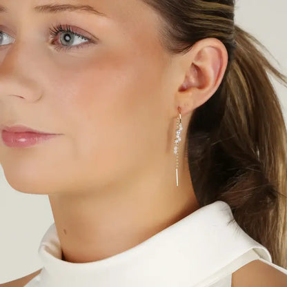 SNÖ Line tassle ear gold/white - Örhänge